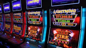 Filipino player reviewing slot game mechanics on okbey mobile platform